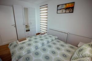 Voodi või voodid majutusasutuse Apartman Vesna toas