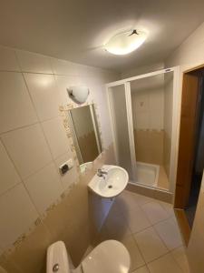 Łazienka w obiekcie Apartamenty pokoje Nad Potokiem