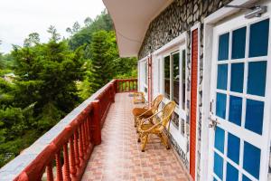 Tarana Cottage by Namastexplorer tesisinde bir balkon veya teras