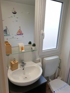 Ett badrum på Seamoon home