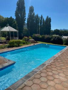 The swimming pool at or close to The Gables-Clarens