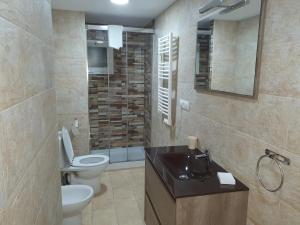 Kúpeľňa v ubytovaní Apartamentos Naranja y Limòn