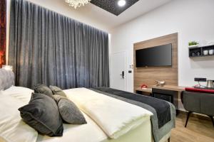Postel nebo postele na pokoji v ubytování Florek & Florica Room001