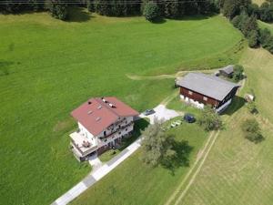 an aerial view of a large house in a field at Aignerbauer Mittersill in Mittersill