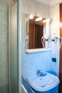 Koupelna v ubytování Hotel Melecchi