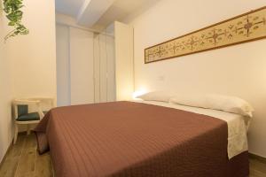 Кровать или кровати в номере casa luna al pigneto