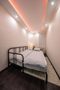 a bedroom with a bed in a room at Spacious 3-room apartment with free parking in Budapest