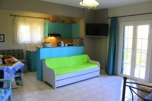 Kuchyň nebo kuchyňský kout v ubytování Tzaneria Apartments Skiathos