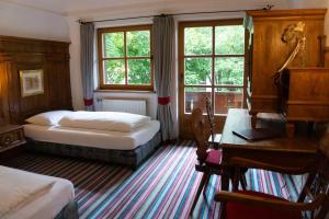Postel nebo postele na pokoji v ubytování Hotel Schrenkhof