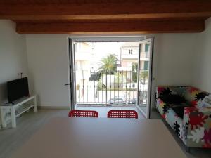 Et tv og/eller underholdning på Attico in centro a Marcelli