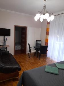 Posedenie v ubytovaní Zöld Sziget Apartmanlakás