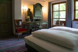 Postel nebo postele na pokoji v ubytování Hotel Schrenkhof