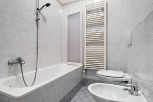 A bathroom at Piazza de' Calderini Apartment by Wonderful Italy