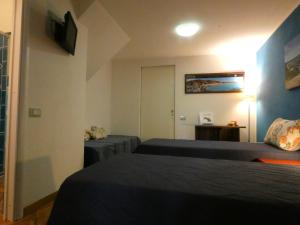 TV a/nebo společenská místnost v ubytování B&B MrCaruba