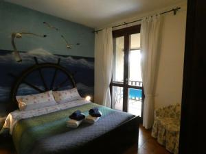 Postel nebo postele na pokoji v ubytování B&B MrCaruba