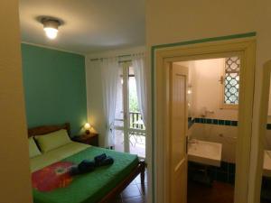 Postel nebo postele na pokoji v ubytování B&B MrCaruba