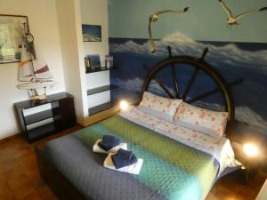 Postel nebo postele na pokoji v ubytování B&B MrCaruba
