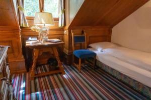 Postel nebo postele na pokoji v ubytování Hotel Schrenkhof