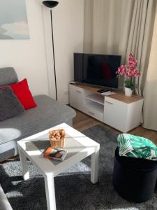 Telewizja i/lub zestaw kina domowego w obiekcie Karkonosze_Cieplice Zdrój