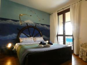 Postel nebo postele na pokoji v ubytování B&B MrCaruba