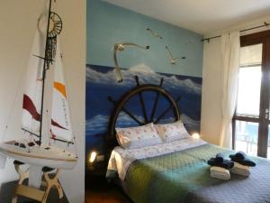 Postel nebo postele na pokoji v ubytování B&B MrCaruba