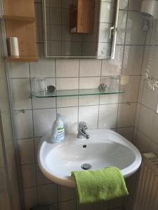 Ванная комната в Gästehaus & Ferienhof Hüfner