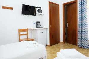 A bed or beds in a room at Apartamentos Vistalmar Mallorca