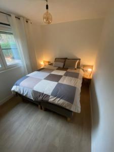 Postel nebo postele na pokoji v ubytování Maison L’ Ambléve