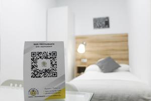 Postel nebo postele na pokoji v ubytování Hotel Restaurante Vía Sevilla - Cádiz by MA 22 Puntos