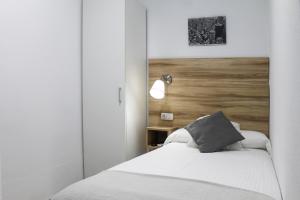 Postel nebo postele na pokoji v ubytování Hotel Restaurante Vía Sevilla - Cádiz by MA 22 Puntos
