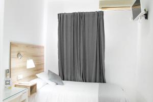 Postel nebo postele na pokoji v ubytování Hotel Restaurante Vía Sevilla - Cádiz by MA 22 Puntos