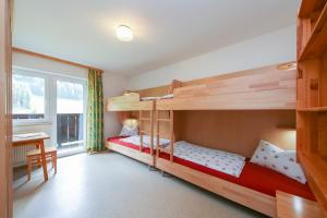 Una cama o camas cuchetas en una habitación  de Apartment Hinterbrandthof