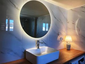 A bathroom at Athens Skylight Condo