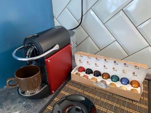 Coffee and tea making facilities at Athens Skylight Condo