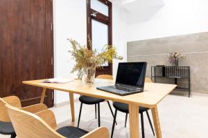 Televízia a/alebo spoločenská miestnosť v ubytovaní Malaga Center Flat Mariblanca 12 Sun & Terrace Boutique
