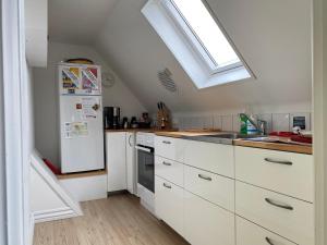 مطبخ أو مطبخ صغير في Apartment med udsigt over Nordmors