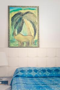 Postel nebo postele na pokoji v ubytování Casa in Centro Foggia
