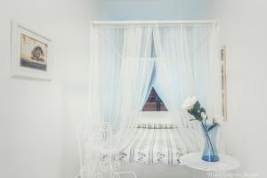 Postel nebo postele na pokoji v ubytování Casa in Centro Foggia