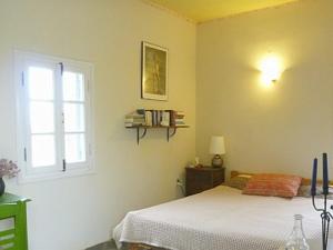 A bed or beds in a room at Katzilieris Country House