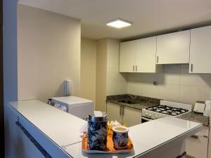 
Una cocina o kitchenette en 9 de Julio Park Suites
