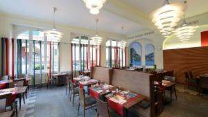 ห้องอาหารหรือที่รับประทานอาหารของ Hotel Pestalozzi Lugano