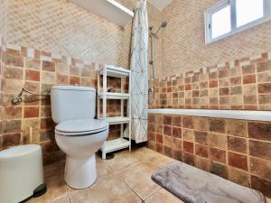 Łazienka w obiekcie CristianPlaya Attic