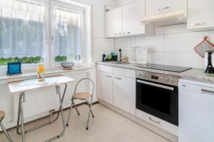 מטבח או מטבחון ב-Apartment Neunzehn