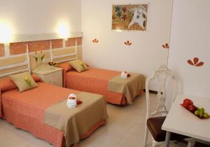 Posteľ alebo postele v izbe v ubytovaní 4Dreams Hotel Chimisay