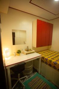 Postel nebo postele na pokoji v ubytování Gamaleya Boutique Hotel
