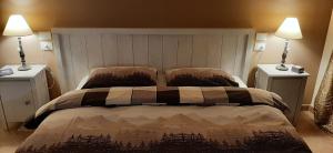 Postel nebo postele na pokoji v ubytování B&B Borgo Arcadia