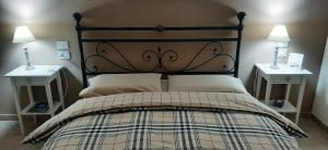 Postel nebo postele na pokoji v ubytování B&B Borgo Arcadia