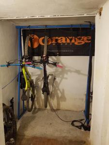 a bike is parked in a garage at Gianluca Apartments 7A in Finale Ligure +1 photo