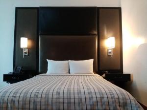 Postelja oz. postelje v sobi nastanitve Hospedium Princess Hotel Panamá