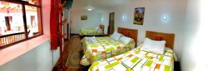 Voodi või voodid majutusasutuse Casa Union Cusco toas